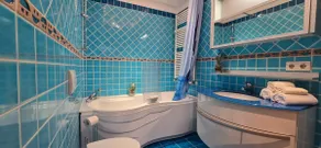 Bright room with private bathroom and market square view - Image 3