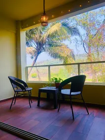 Palms & Peace - A Serene getaway with a hill view. - Image 5