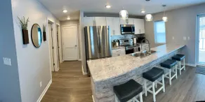 Updated Riverside Home in Oconto - Image 4