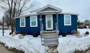 Updated Riverside Home in Oconto - Image 2