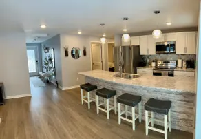 Updated Riverside Home in Oconto - Image 3