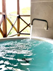 Enjoy a semi-open-air bath & hot spring BBQ in the garden while looking out at the sea Late check-out until 3 pm 1 group per day, 1-8 people - Image 3