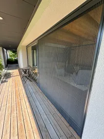 A designer cottage with a terrace and a fireplace - Image 5