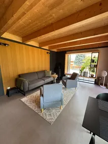 A designer cottage with a terrace and a fireplace - Image 3