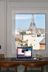 Eiffel Tower View | Elegant Studio Balcony + A/C - Image 5