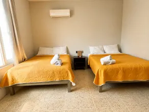 Mangos Apartment | AC+ Wifi+ Hot Water+ Kitchenette - Image 5