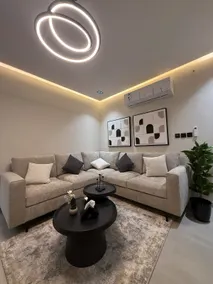 Modern Al Muruj Apt | Cozy Bathtub | 65” TV - Image 2