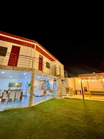 Modern house with pool, large garden and grill - Image 4