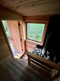 Handcrafted creative cabin with a sauna and piano - Image 3