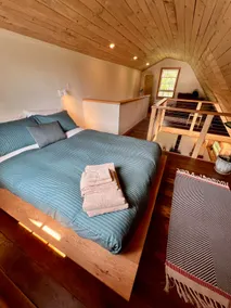 Handcrafted creative cabin with a sauna and piano - Image 2