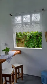Room with a mini kitchen. - Image 3