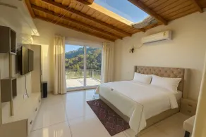 Shail by Shubhs Villas overlooking a deep valley - Image 3