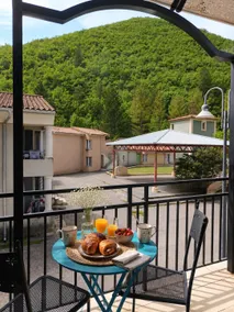 Cozy 1BR with Balcony, Pool & Thermal Spa - Image 4