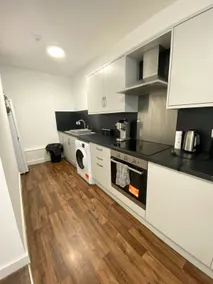 Cosy 1BR in Failsworth - Secure Parking & WiFi - Image 4