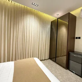 1BR APT l 65” 4K TV - Image 5