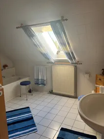 Beautiful attic apartment with balcony in Osloß - Image 4