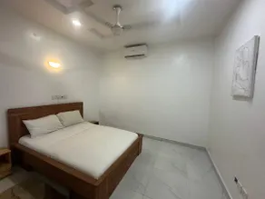 Two-bedroom apartment with living room, rooftop, and Jacuzzi. - Image 5
