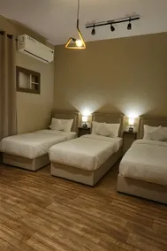 Three bedrooms apartment with 70-inch screen in the living room - Image 2