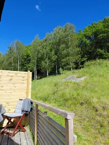 Modern apartment with patio by meadows, forest and sea - Image 4