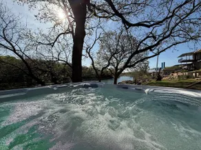 Waters Edge: A Luxurious Waterfront Retreat hottub - Image 5