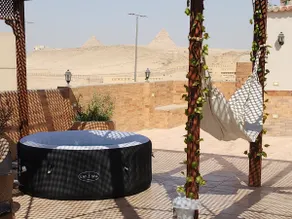 private rooftop with hot jacuzzi and pyramids view - Image 5