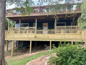 Home: Sleeps 10, creek, firepit & game room - Image 3