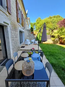 Charming urban retreat with garden and terrace. - Image 2