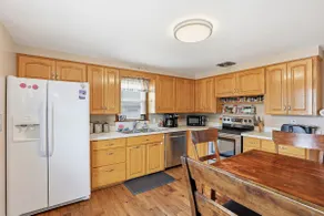 Cozy 5-Bed Home with Fenced Yard! - Image 4