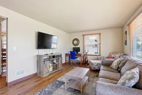 Cozy 5-Bed Home with Fenced Yard! - Image 2