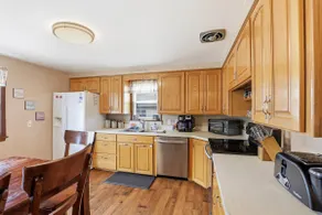 Cozy 5-Bed Home with Fenced Yard! - Image 5