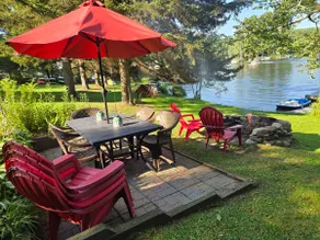 Adirondack Hideout, lakefront location and sandy shoreline - Image 4