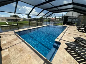 Stunning family canal home with heated pool - Image 1