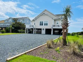 FINS to the Left - Duplex East Side - Image 3