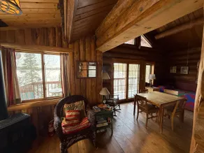 Classic log cabin on amazing lake - Image 4