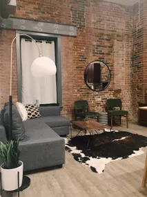 Modern Brick Loft > Best LOCATION Downtown!! 103 - Image 2