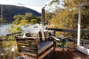 Water, trees, sky and a house on the rocks. - Image 3