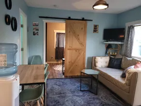 Adorable cottage retreat. Unwind in the private hot tub, enjoy a BBQ, and 🔥 pit - Image 2