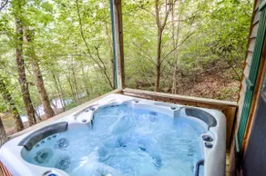 Hunker Down by the Creekbank in this Cozy Private - Image 4