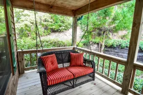 Hunker Down by the Creekbank in this Cozy Private - Image 2