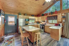 Cozy Manistique Cabin w/ Deck, Grill & Fire Pit! - Image 5