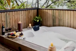 Jacuzzi on a covered deck with mountain views - Image 3