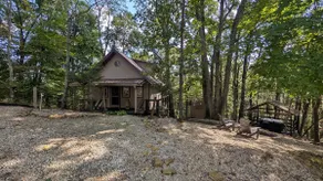 Quaint Cabin w/ Elevated Back Deck Among the Trees - Image 2