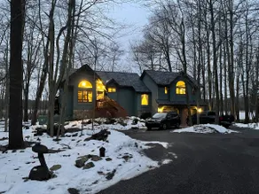 Lakefront Chalet with Private Beach and Hot Tub - Image 4
