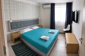 Santorini Symmetry Apartment-Spacious Stay for up to 8 Guests in Megalochori Village - Image 4