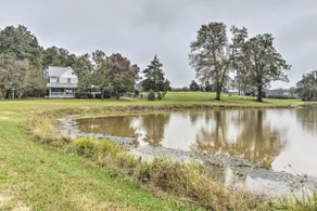 Remodeled Pittsboro Farmhouse Sitting on 220 Acres - Image 3