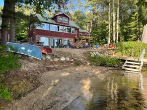 Lakefront Home With Sandy Walk In Beach - Image 2