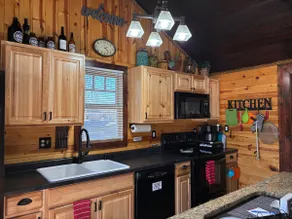 Cozy 4BR 2BA Cabin in Town near Trails. Fire Pit+ - Image 5