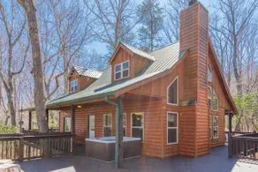 CUSTOM BUILT CABIN WITH SAUNA & HOT TUB - Image 2