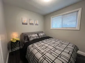 Burl-Town | Bright 2BR Main Floor Suite w/ Parking - Image 4