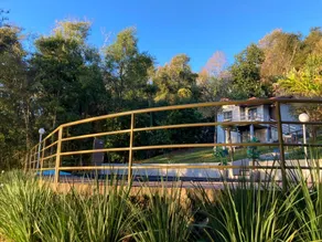 Lake house with swimming pool integrated into nature - Image 5